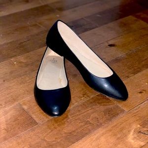 Black leather flats